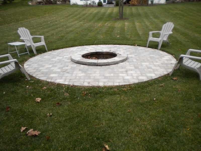 Should I Install an Outdoor Fireplace or Firepit - JT Landscaping